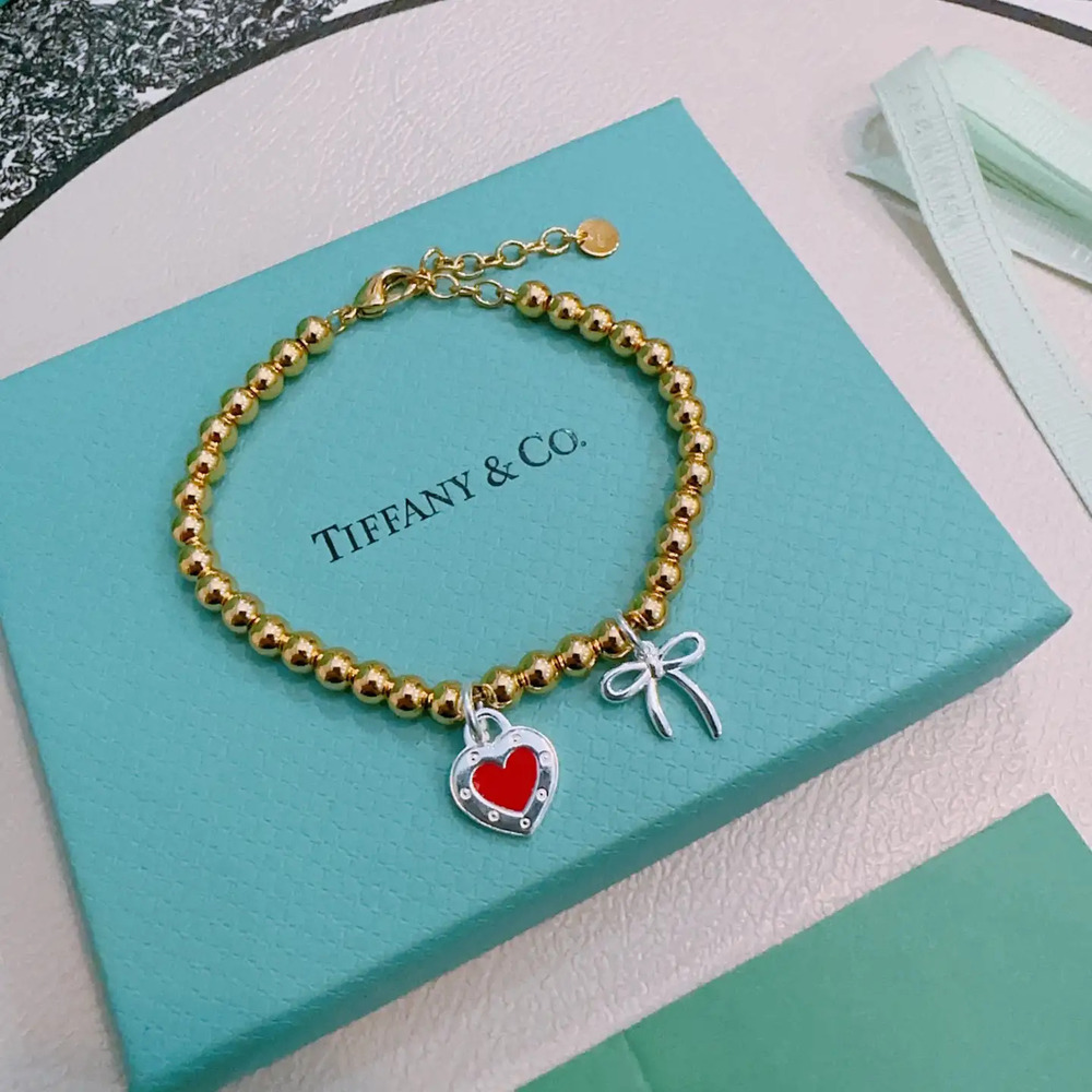Tiffany & Co. Red and Silver Hearts, Gold Bracelet
